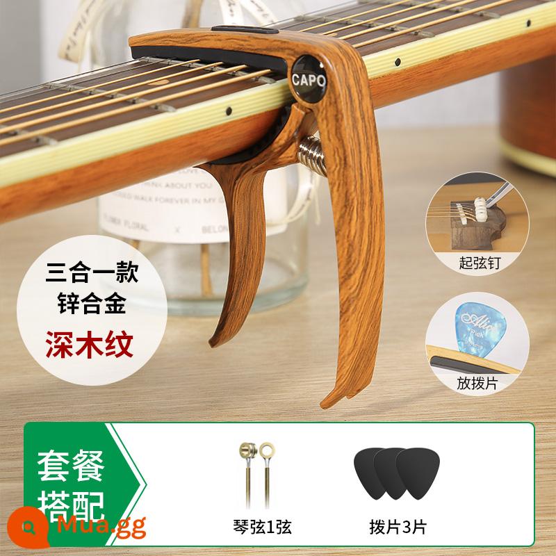 Capo Đàn Guitar Đặc Biệt Đàn Ukulele Đàn Guitar Điện Dân Gian Acoustic Phụ Kiện Guitar Cao Cấp Kama Chỉnh Kẹp - [Bộ gắp có thể kẹp ba trong một] Vân gỗ sẫm màu ★ Tặng kèm 1 dây + gắp*3