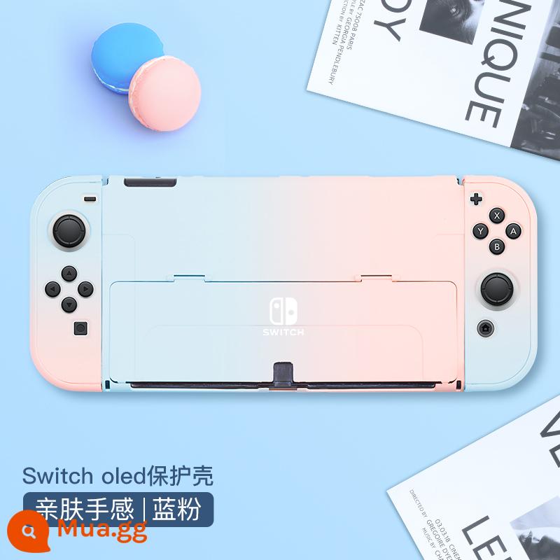 Chính thức Nintendo switcholed vỏ bảo vệ công tắc tay cầm vỏ ns vỏ cứng đế có thể cắm vỏ trong suốt vỏ oled túi lưu trữ bộ phụ kiện silicone mềm vỏ mềm riêng biệt tay áo silicone - Vỏ chuyển đổi thân thiện với da "gradient màu xanh hồng" đi kèm với màng + nắp