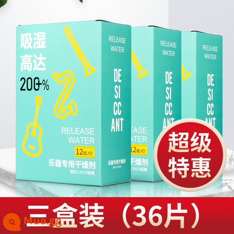 Chất hút ẩm chuyên dụng cho nhạc cụ guitar ukulele piano điện ống thổi chống ẩm máy hút ẩm túi chống ẩm hộp túi hút ẩm - Ba hộp (36 miếng)