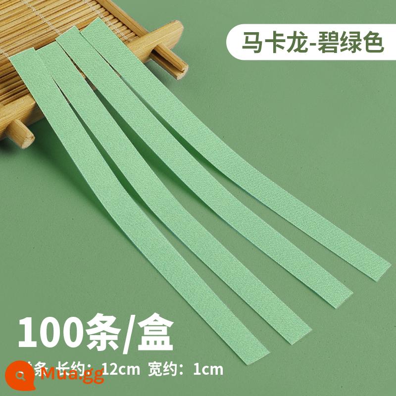 Cut-free guzheng băng biểu diễn chuyên nghiệp băng trẻ em thở thử nghiệm đặc biệt chống dính dính tốt đàn tỳ bà - Macaron ngọc lam 1 hộp