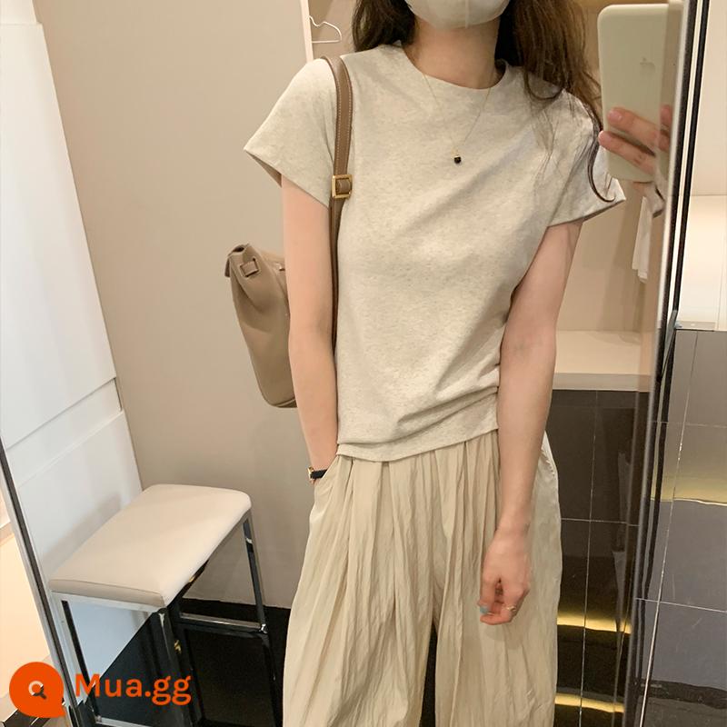 Áo thun cotton vai trước nữ ngắn tay mùa hè mới cổ tròn xếp tầng áo sơ mi slim fit giảm béo hàng đầu màu trắng - tro bột yến mạch