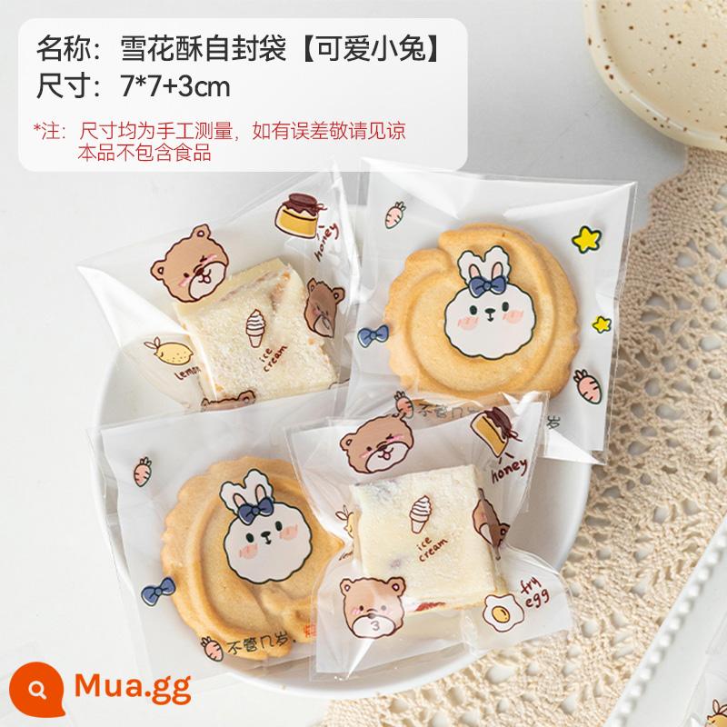 Snowflake sắc nét bao bì túi bánh quy bánh quy bánh quy cá nhân nhỏ bao bì túi sữa táo tàu kẹo dẻo máy niêm phong túi giấy - Túi tự dính hình bông tuyết Crisp [thỏ dễ thương]