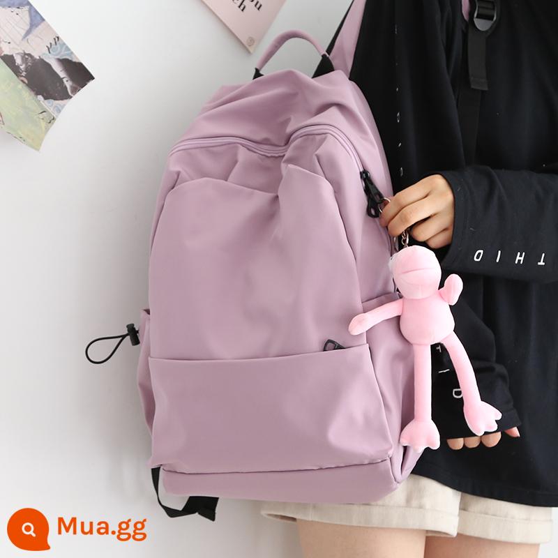 NR Mori Large -capacity Pure Color Backpack Phiên bản tiếng Hàn Barbuds nam giới trung học nữ sinh học Pepsie College - Ếch mắt to màu tím + hồng