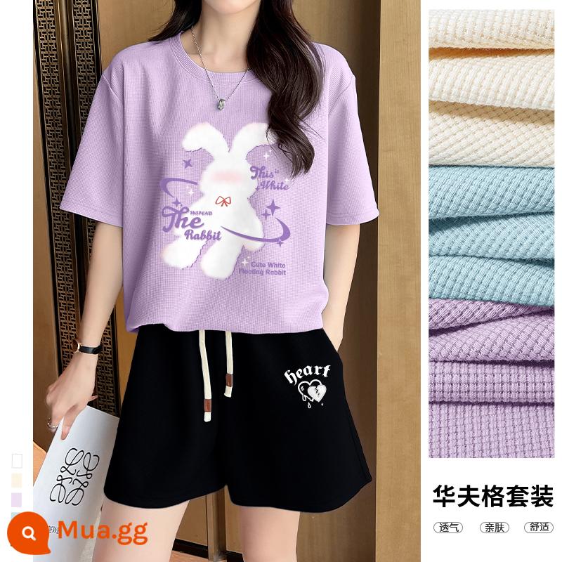 Bộ quần áo thể thao Jeanswest LIFE quần áo mùa hè nữ 2023 mới rộng rãi quần short ngắn tay hai mảnh giản dị thủy triều mùa hè - [Phiên bản dài vừa phải] Thỏ treo hoa cà + [quần ba phần tư] trái tim trắng đen k