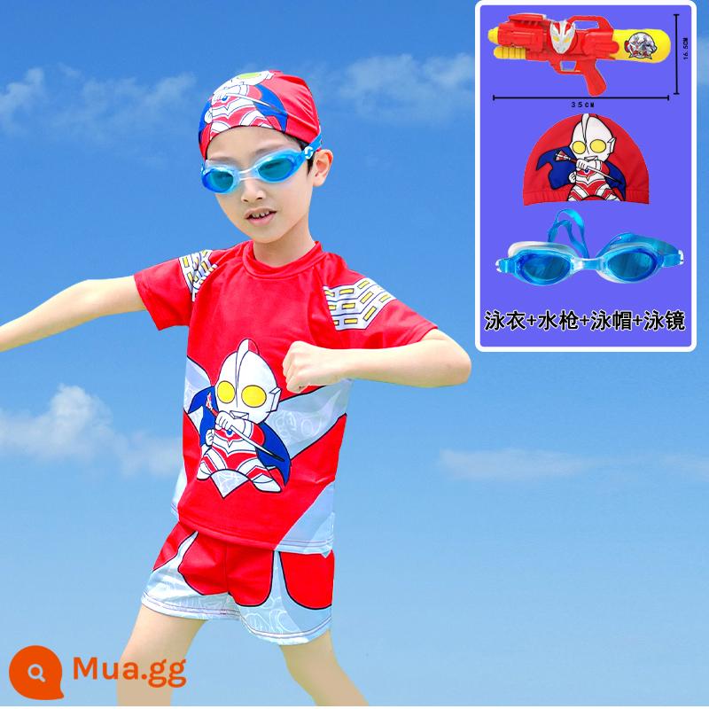 Áo tắm bé trai Áo tắm một mảnh hai mảnh Ultraman cho bé 2023 phong cách mới phong cách nước ngoài bé trai mùa hè - Mũ bơi miễn phí màu đỏ + [kính bơi] + súng nước hai mảnh