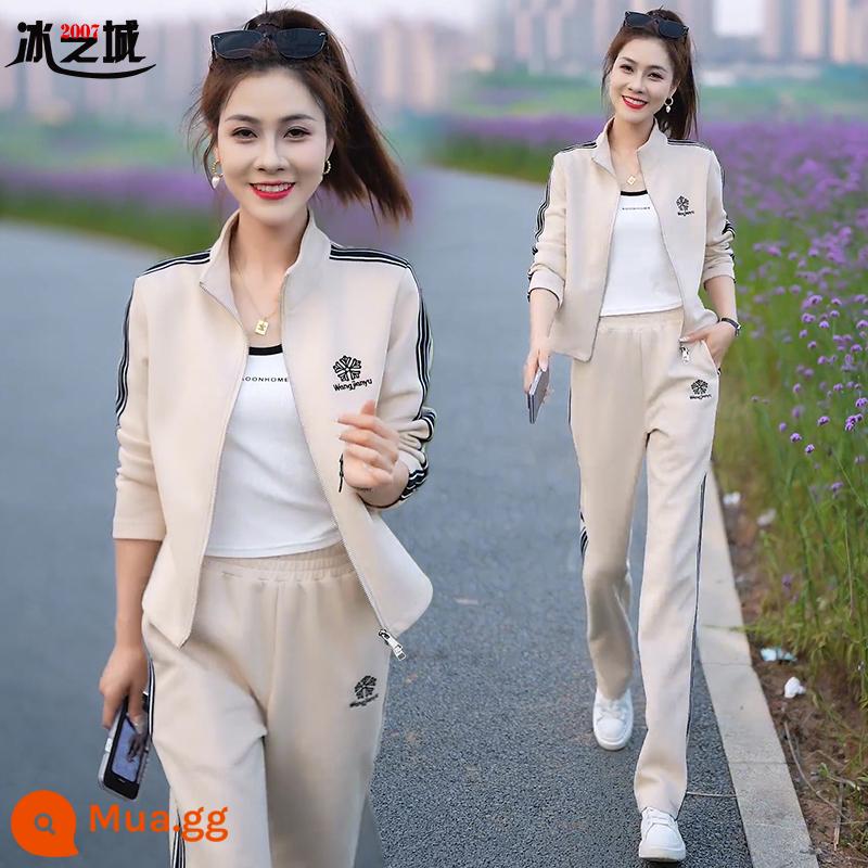 Bộ đồ thể thao thông thường cho nữ 2023 xuân thu thời trang mới giảm tuổi tác dây kéo cardigan quần ống rộng Bộ ba món - Quả mơ [bộ hai mảnh]