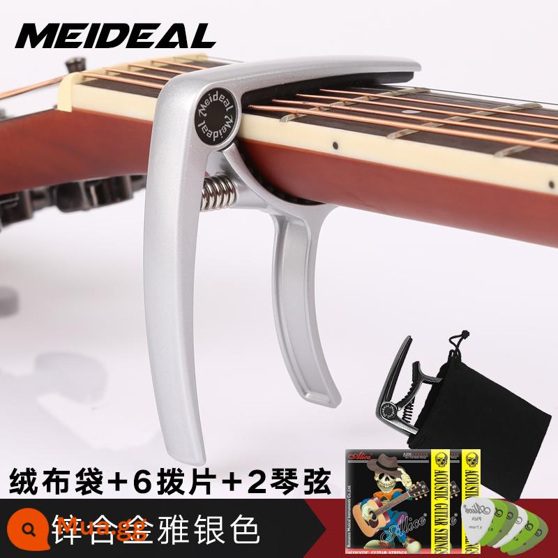 Cao cấp khắc dân gian đàn guitar chuyển vị clip kép ukulele đổi chỉnh clip chuyển vị phụ kiện đàn guitar - Capo kim loại màu bạc mờ MC10 [đi kèm túi nhung + 1 dây + 2 dây + pick*6]