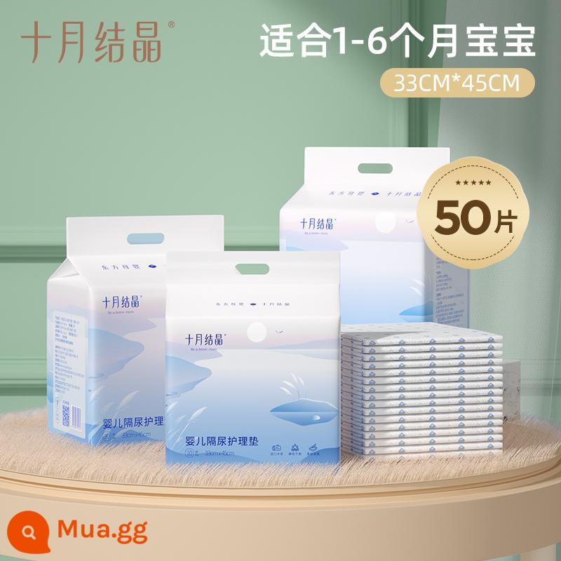 Tháng 10 pha lê nước tiểu cho bé miếng lót dùng một lần cotton thoáng khí chống thấm nước cho bé sơ sinh chăm sóc đệm bảo vệ đệm - Size vừa 50 miếng [33*45cm]