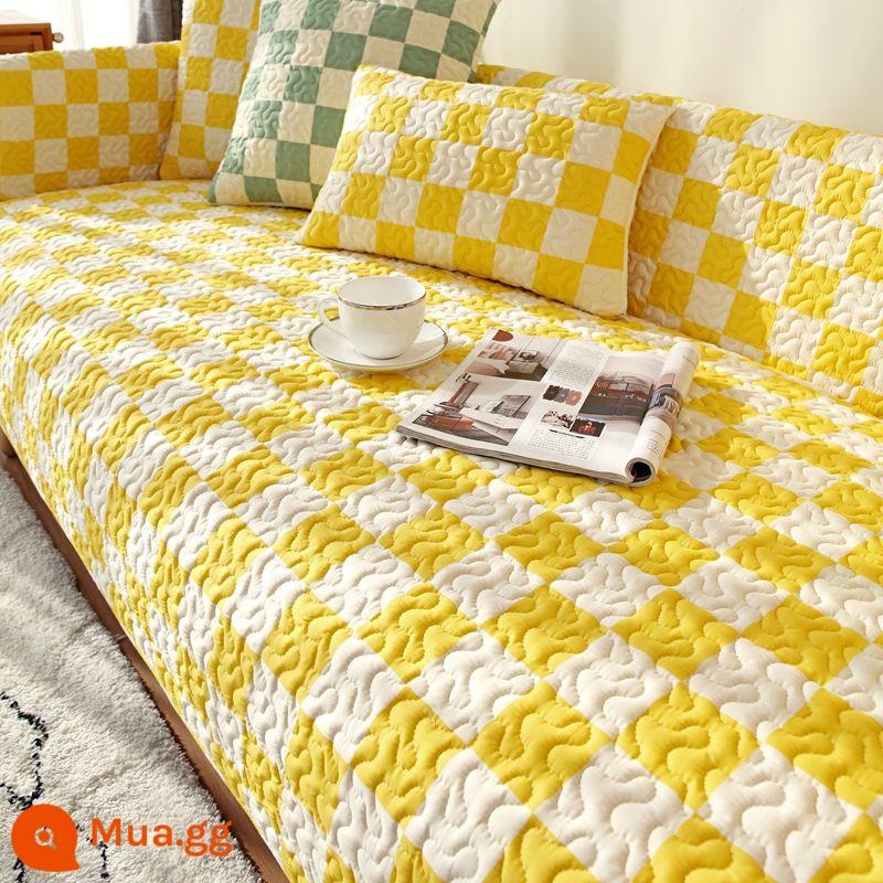 Đệm sofa bông chống trượt giá đặc biệt vải cotton nguyên chất bốn mùa hiện đại đơn giản bao trọn gói giải phóng mặt bằng phổ khăn khăn đệm ghế - Bàn cờ cotton màu vàng