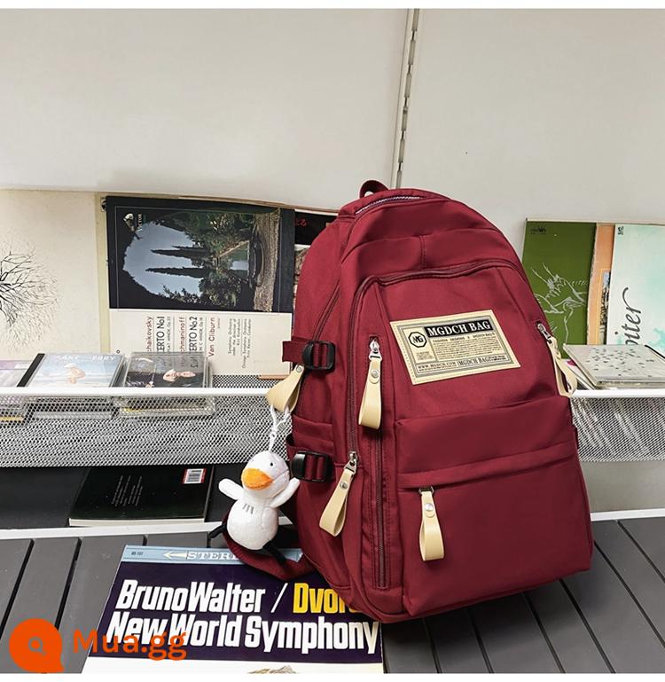 Schoolbag nữ sinh viên đại học công suất lớn nam sinh trung học cơ sở học sinh trung học cơ sở nữ sinh ba lô ba lô ba lô 2023 phong cách mới - Kèn Trumpet đỏ [công suất lớn] (mặt dây chuyền con vịt)