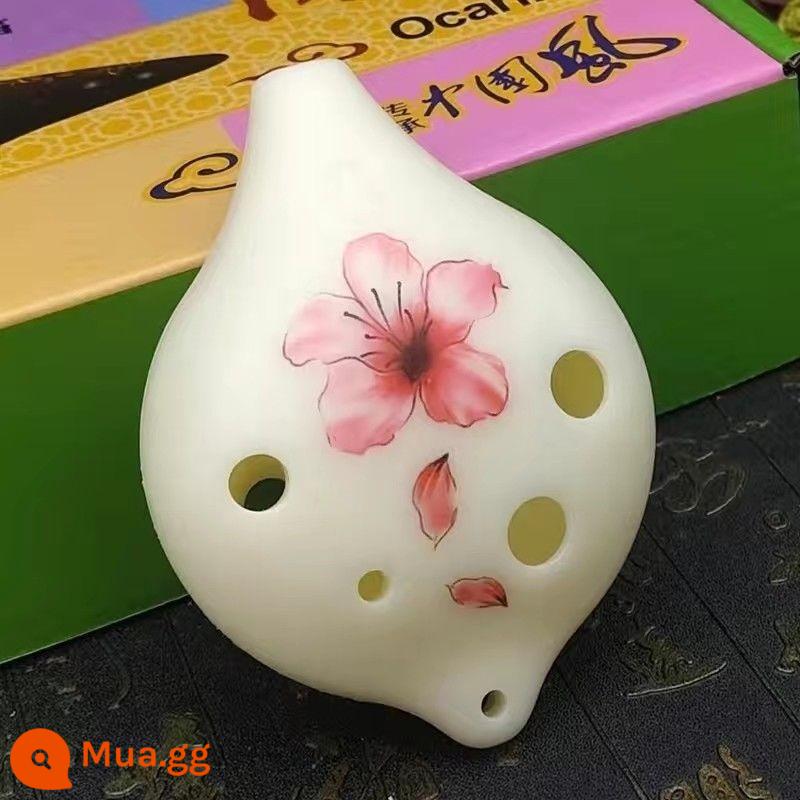 Sinh viên chống rơi 6 lỗ ocarina alto C tông nhựa nhựa AC người mới bắt đầu nhựa 6 lỗ phụ kiện miễn phí vận chuyển nhạc cụ - Miệng ngắn nhựa 6 lỗ sơn AC tone trở lại, sáo trần không kèm phụ kiện