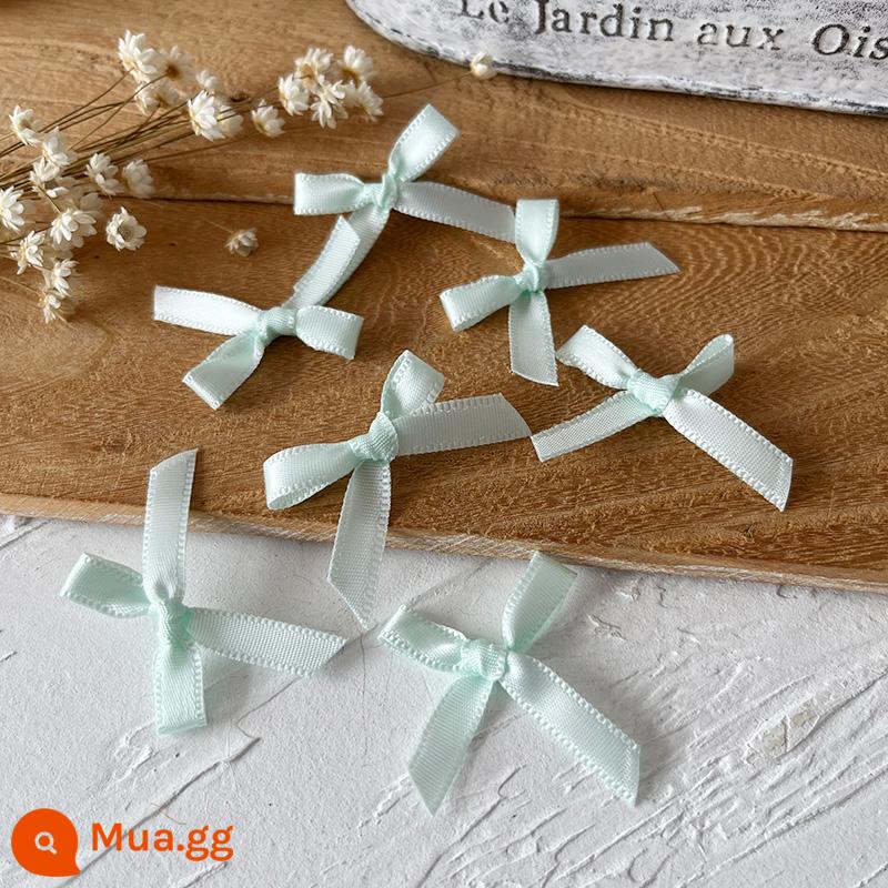 Rộng 2.5cm ruy băng handmade thành nơ handmade DIY chất liệu quần áo phụ kiện tóc phụ kiện đựng thẻ chất liệu trang trí - 10 chiếc nơ nhỏ màu xanh lá cây, chiều rộng ruy băng 0,6cm