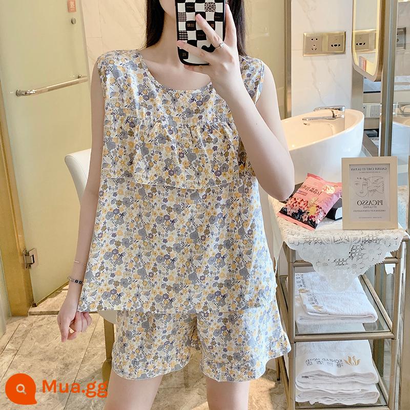 Bộ đồ ngủ chống va đập mùa hè của phụ nữ cotton lụa siêu mỏng mùa hè vest quần short không tay phù hợp với dịch vụ gia đình sinh viên - Áo vest hoa màu be chống lồi