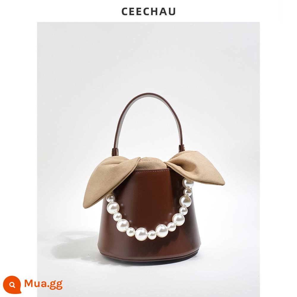 CEECHAU Pearl Ear Leather Bucket Bag Messenger Niche Design Nơ Túi xách da bò hình trụ - Màu caramel (da bò)