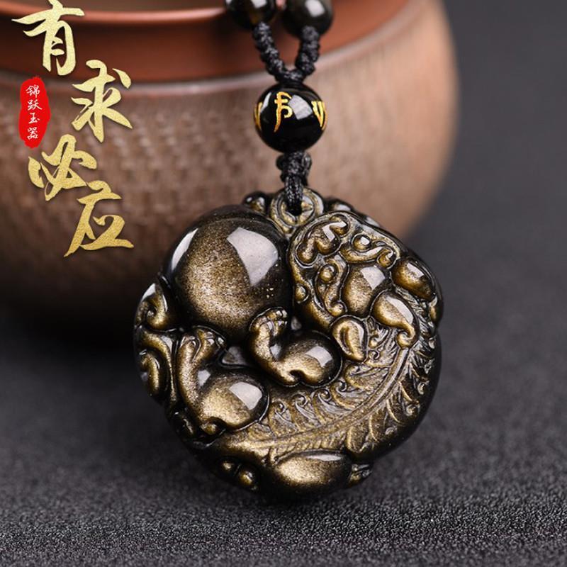 Đấu giá một nhân dân tệ để nhận mặt dây chuyền obsidian tự nhiên và vàng