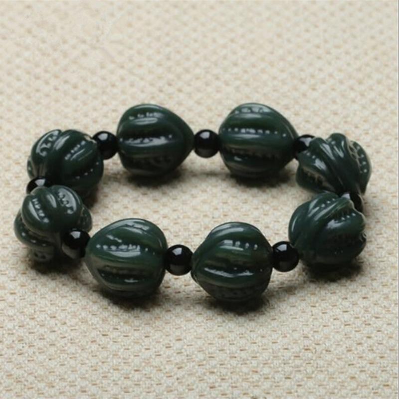 Rò rỉ đấu giá Tân Cương Hetian Jade Sapphire Sapphire Óc chó Vòng tay ngọc bích đen làm bằng tay Quả óc chó với 8 thắt lưng và hạt đào