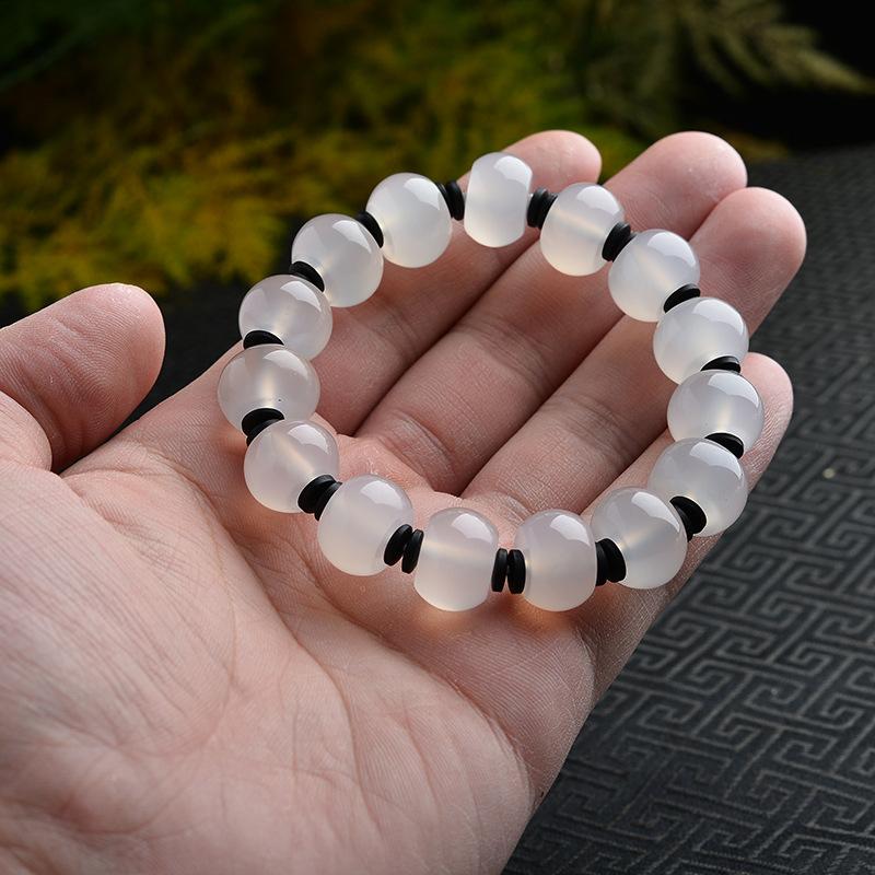 Một nhân viên đánh giá rò rỉ của Yuan Rò bị rò rỉ tay trắng, nam và nữ agate chalcedony abacus, vòng tay hình tròn bằng trống