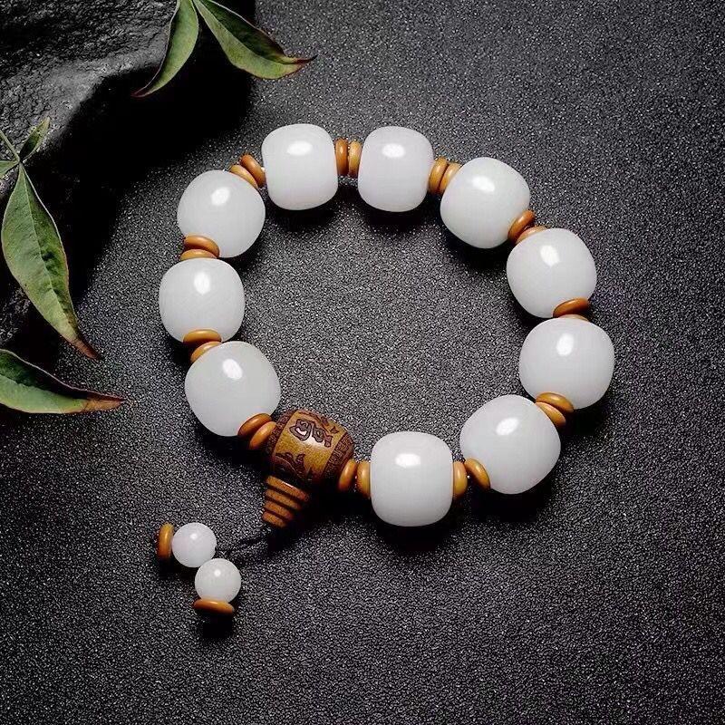 Một cuộc đấu giá Yuan Xinjiang Jinshi Jade Old Beads Balls và Balfatt White Jade Stone Bracelet