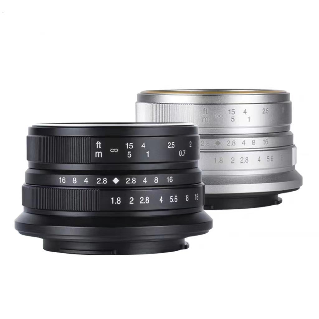 Bảy thợ thủ công Ống kính máy ảnh một mắt siêu nhỏ 25 mm F1.8 Máy ảnh một mắt siêu nhỏ khóa khẩu độ lớn chân dung lấy nét cố định đầu nửa khung hình toàn khung hình