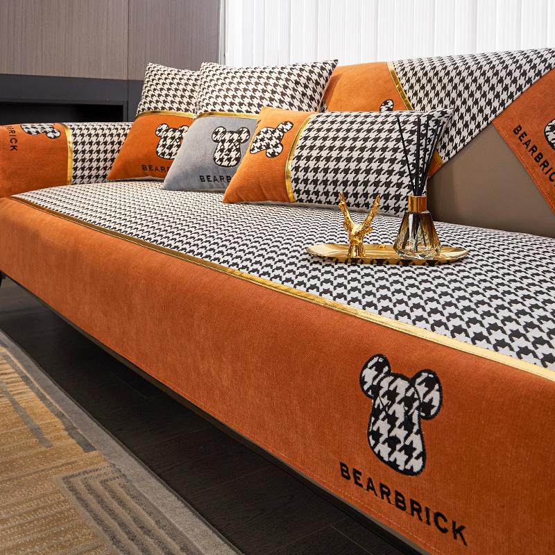 Đệm sofa Houndstooth màu cam nhẹ sang trọng hiện đại cao cấp bốn mùa đa năng 2022 mới bọc da chống trượt bao khăn