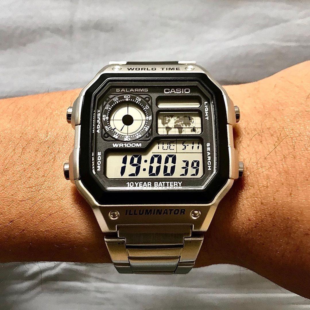 Casio Đồng hồ nam nữ thể thao ngoài trời chống thấm nước đồng hồ điện tử khối nhỏ màu bạc AE-1200WHD-1A